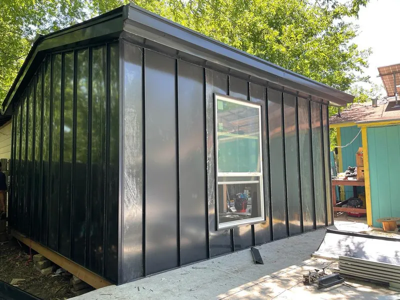 Black standing seam metal wall panels for Roof Inspection in Killingly